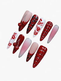 Ensemble de 10 faux ongles Cherry Rouge en forme d'amande avec motifs lèvres, cerises 3D, dégradé rose et rouge.