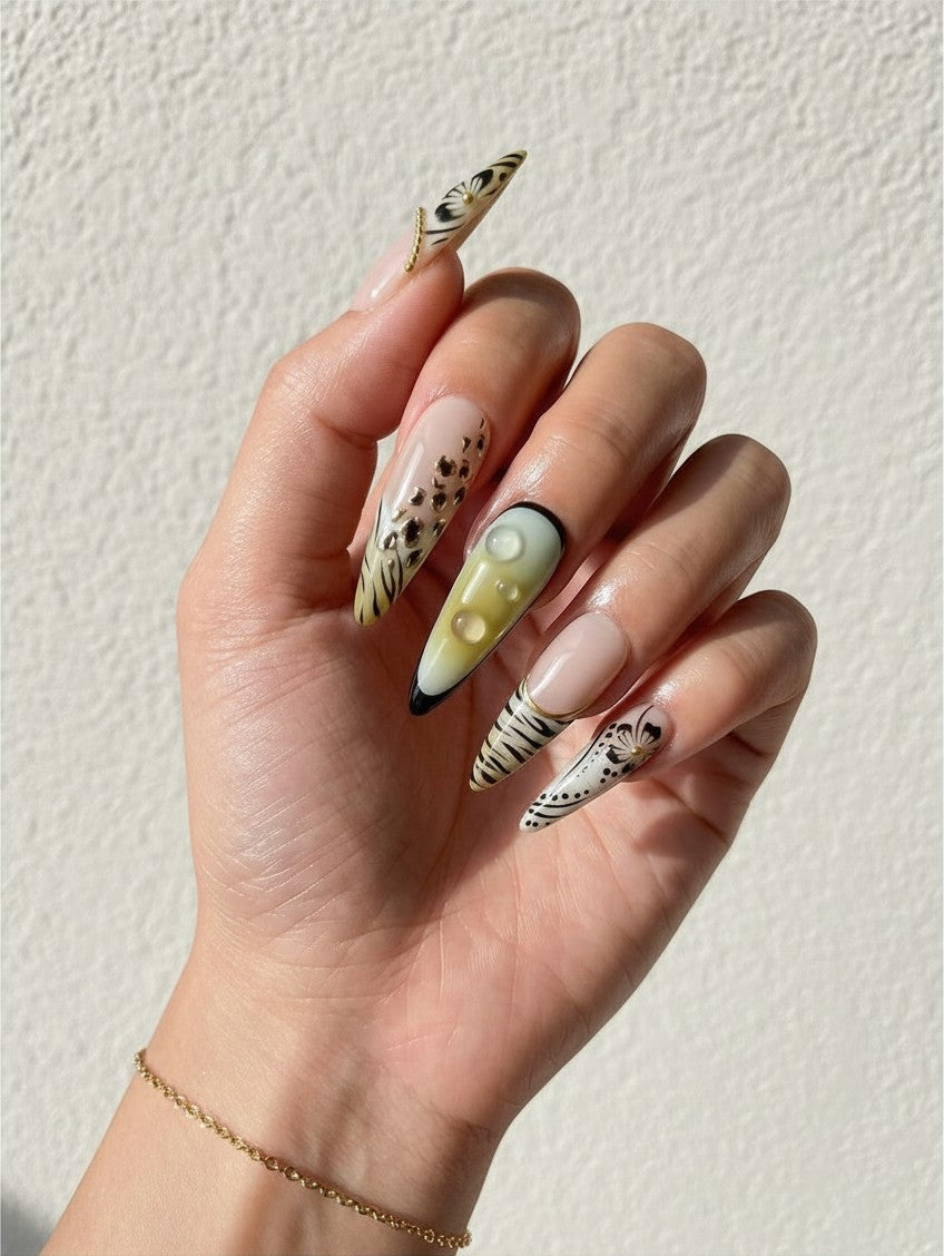 Faux ongles Cherry Rouge longs en amande style Y2K avec motifs silhouettes végétales et détails en relief