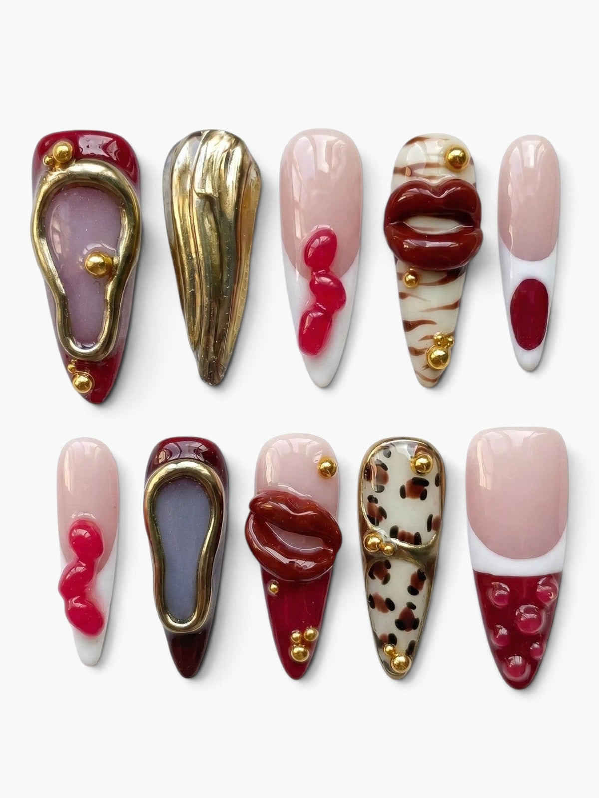 Set de 10 faux ongles Cherry Rouge forme amande avec motifs lèvres 3D, détails dorés et imprimé léopard sur fond nude