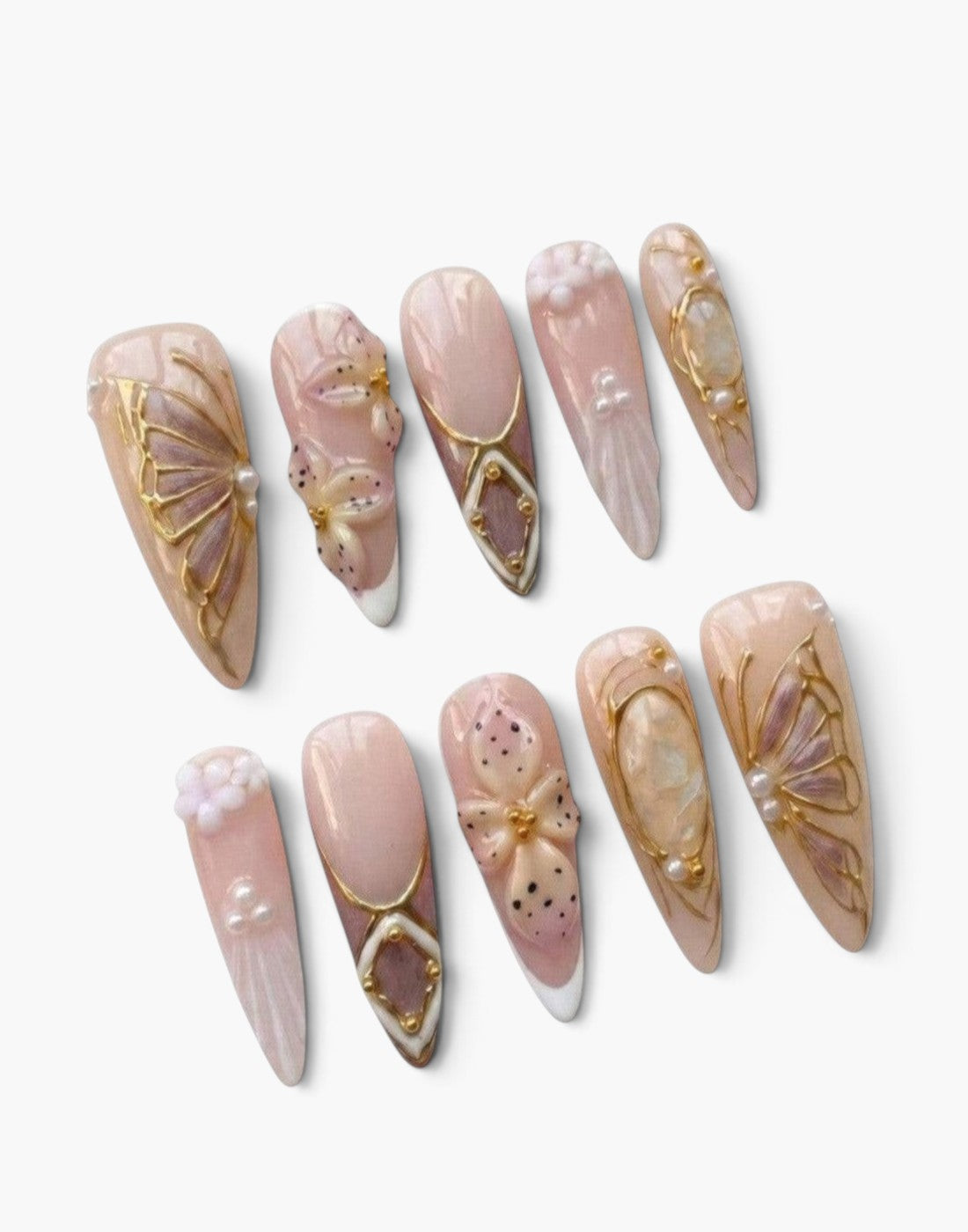 Set de 10 faux ongles Cherry Rouge stiletto nude avec fleurs 3D, détails dorés, motifs animaliers et finition gel