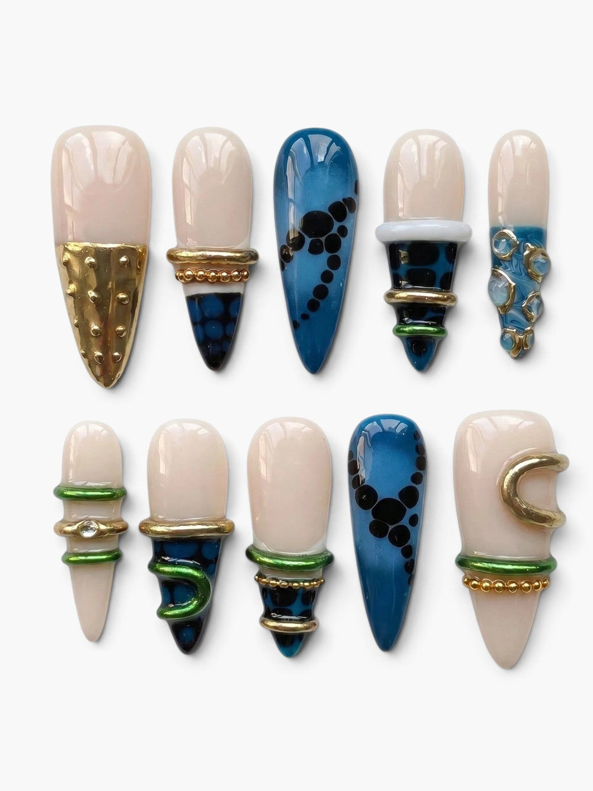 Set de 10 faux ongles Cherry Rouge Gilded Cascade en ABS, décorés de motifs bleus, dorés et verts faits main.
