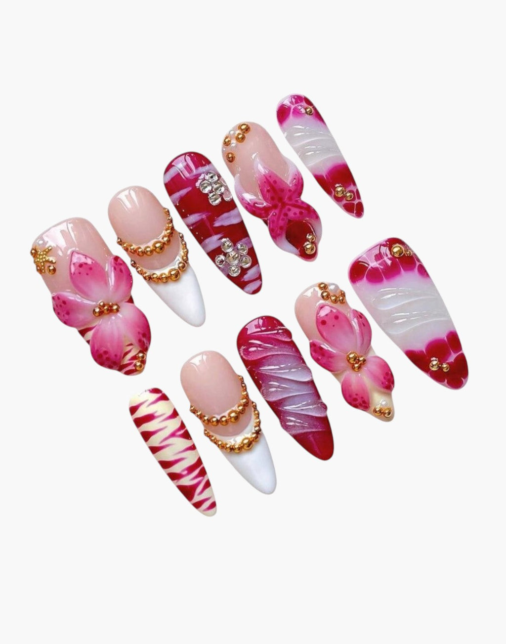 Manucure Cherry Rouge Blooming Luxe amande avec fleurs 3D roses, détails dorés, effets marbrés et ornements bijoux
